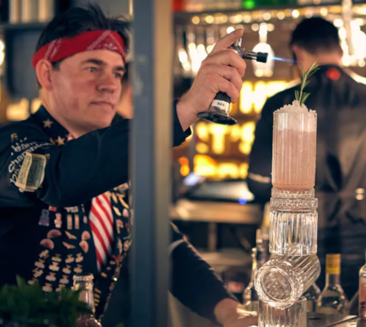 Bartender making cocktail